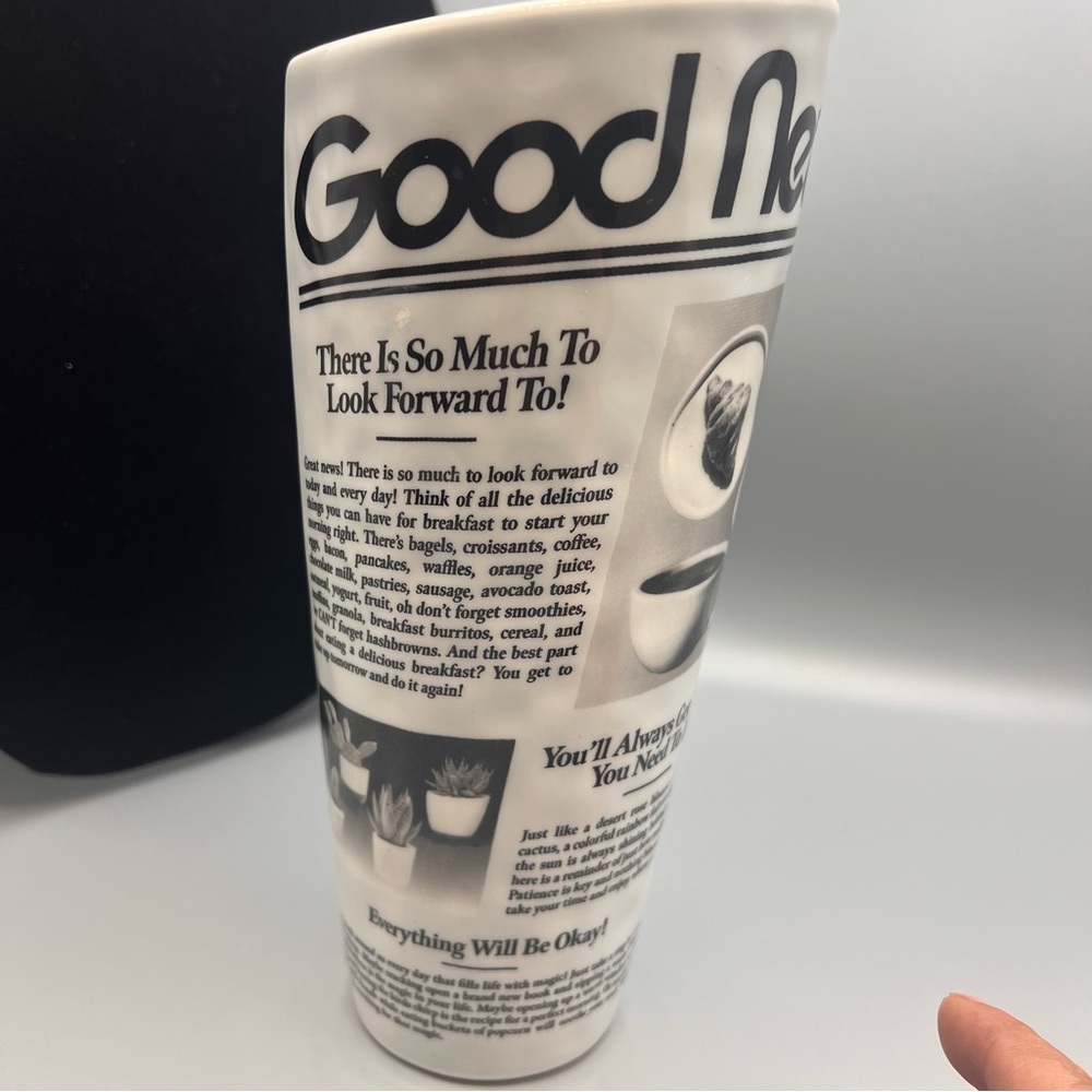 Good news positive ban.do Newspaper Ceramic Vase with a rolled newspaper design.